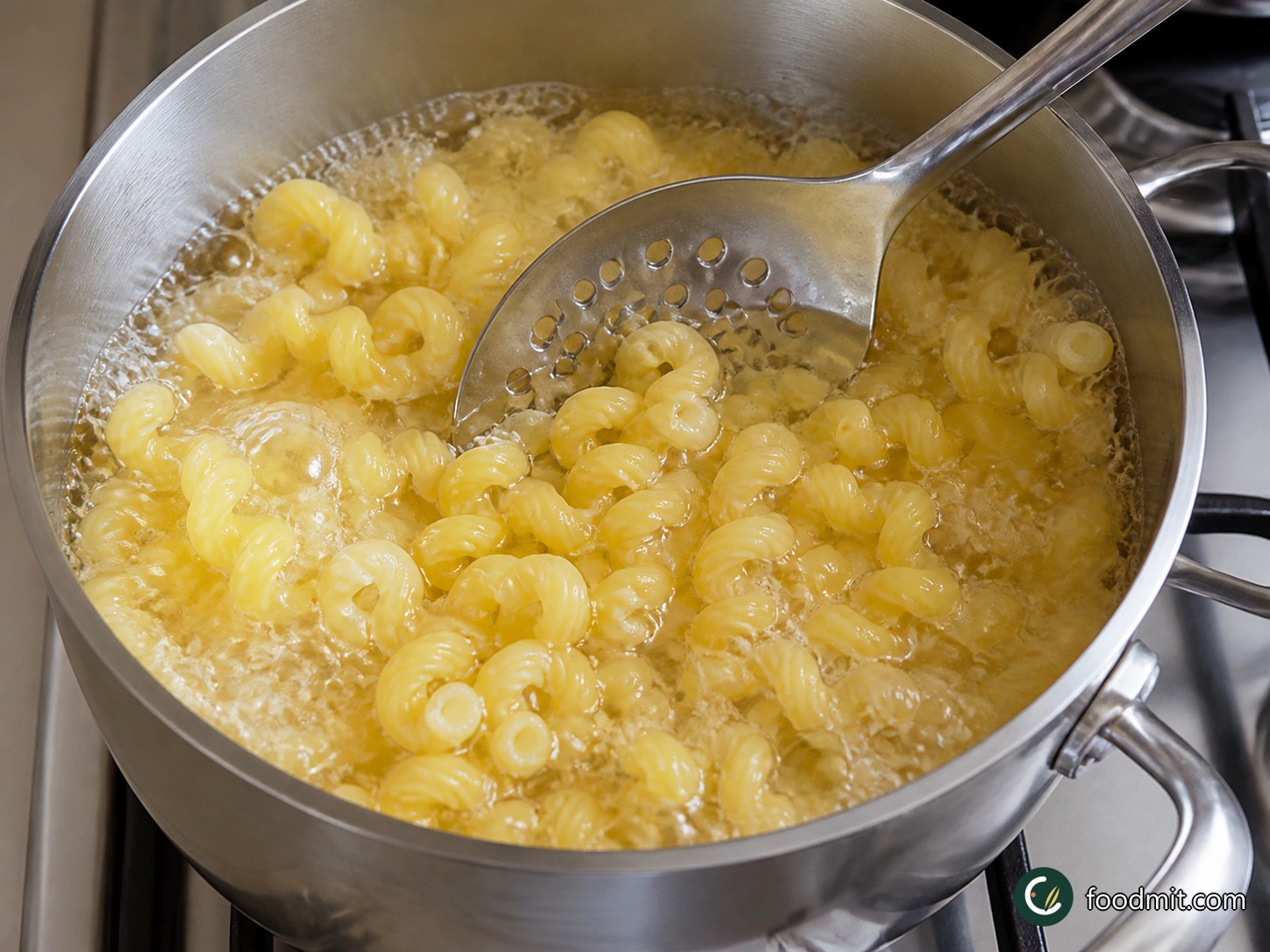 Heat the oven to 350°F. Bring a medium pot of well-salted water to a boil and cook the cavatappi until al dente, stopping 2 minutes before the package directions say it should be done. Scoop out 1/4 cup of the pasta water, then drain the pasta. Keep both close by for the sauce.