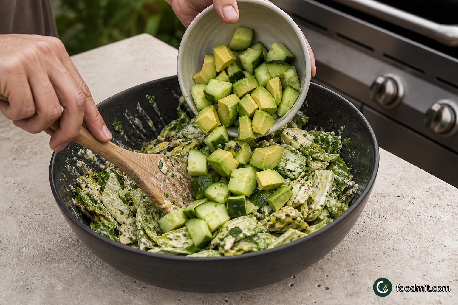 Peel and stone the avocado, then cut it into rough bite-size pieces. Roughly chop the cucumber to a similar scale. Add both to the serving bowl and turn them gently through the dressed grilled vegetables, taking care not to mash the avocado.